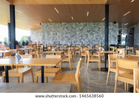 High end cafeteria interior design with wooden-cement composite in yellow tone table suit