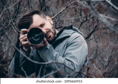 High end camera user.  Camera operator. Photographing the photographer.