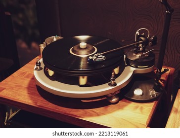 High End Turntable In The Low Light Room.              