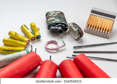 High Explosive Fireworks Ready To Be Detonated By Matches Or Pocket Lighter Shows Risk Of Injury At Silvester For Fire Insurance And On New Years Eve As Happy New Year Fire Cracker And Banger Pyrotech