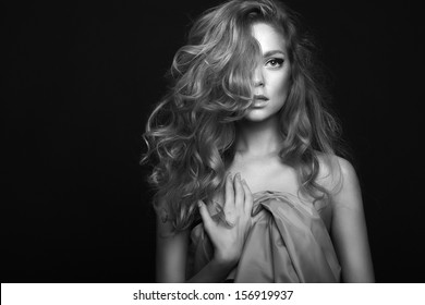 High Fashion. Emotional Portrait Of A Beautiful Sexy Blonde With Long Hair And Bright Make-up