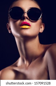 High Fashion Look.glamor Closeup Portrait Of Beautiful Sexy Stylish Mode In Sun Glasses With Bright Colorful Lips  With Perfect Clean Skin In Studio