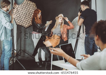 High fashion model during photoshoot for magazine cover