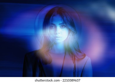 High Fashion Model Girl In Bright Colorful Neon UV Lights Posing In Studio, Portrait Of A Beautiful Woman, Trendy Retro Look, Generation Z. Blue Glow Effect.