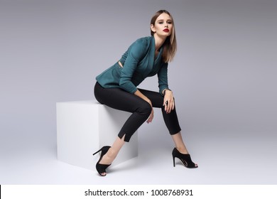 High Fashion Portrait Of Young Elegant Woman. Suede Jacket, Skinny Black Pants, Black Heels Shoes