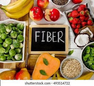 High Fiber Foods on a white wooden background. Flat lay - Shutterstock ID 493514722
