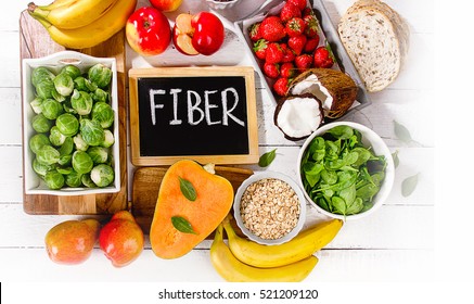 High Fiber Foods on a wooden background. Flat lay - Shutterstock ID 521209120