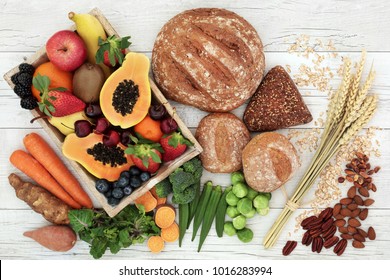 High Fibre Health Food Concept With Fresh Fruit, Vegetables, Wholegrain Bread, Nuts And Cereals. Foods High In Antioxidants, Anthocyanins, Omega 3 Fatty Acids And Vitamins.  