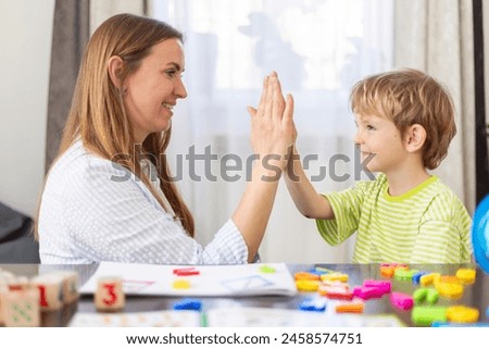 High Five in a Children's Educational Setting