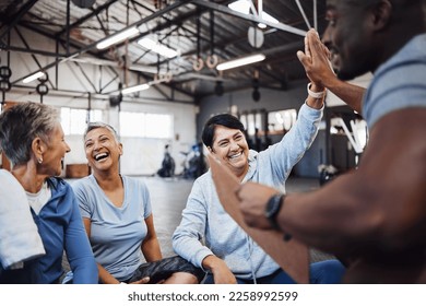 High five, group or team of fitness senior women at the gym after exercise, workout or training with personal trainer. Elderly, old and people happy, smile and excited for teamwork and motivation - Powered by Shutterstock