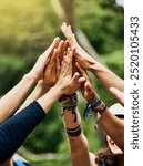 High five, hands and group of people outdoor with collaboration, motivation and solidarity for activity. Friends, trust and together in nature with cooperation, community or bonding for team building