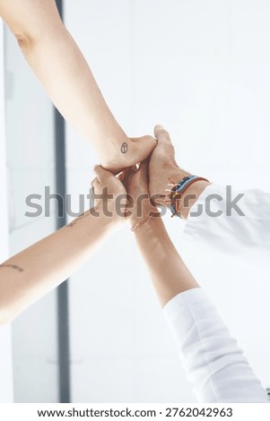 High five, low angle and trust with doctors in hospital for solidarity, synergy and healthcare. Medical, teamwork and commitment with people in clinic for insurance, community and collaboration