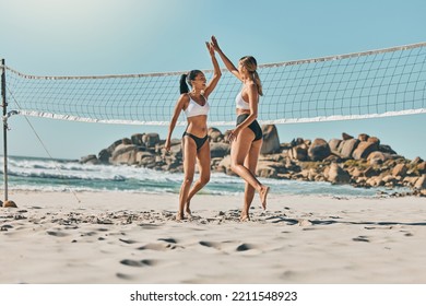 High five, women and beach volleyball success team by Miami, Florida ocean, sea or nature in summer. Smile, happy or winner sports friends in fitness support, workout training or bikini sand exercise - Powered by Shutterstock