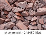 High grade (more than 63% Fe content) Australian iron ore, hematite (Fe2O3). Blast furnaces feed for iron-making. Background concept.