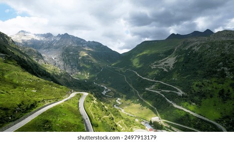 High green mountains of Swiss, Roads,fogy, beautiful, landscape, summer, Aerial Landscape, drone point of view, Aerial View, Drone Footage, Skyline ,Bird’s Eye View,4K Drone,Nature, Real Estate,Travel - Powered by Shutterstock