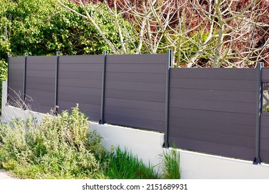 high grey fence modern barrier aluminum slats suburb house protection view home - Shutterstock ID 2151689931
