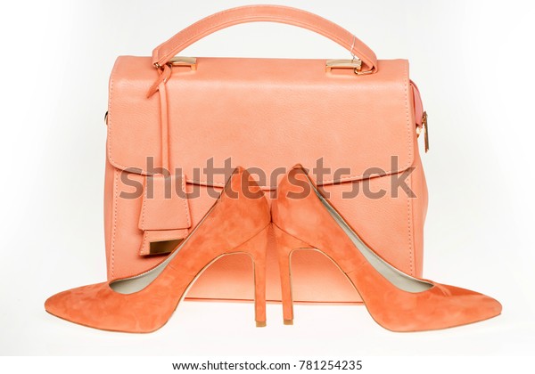 orange heels and bag