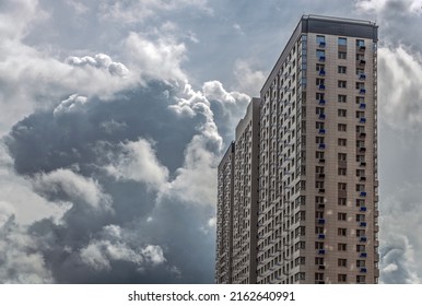 High House And Threatening Clouds