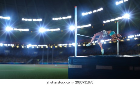 High Jump Championship: Professional Female Athlete On World Championship Successfully Jumping Over Bar. Shot Of Competition On Stadium With Sports Achievement Experience. Determination Of Champion.