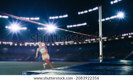 High Jump Championship: Professional Female Athlete on World Championship Running to Jump over Bar. Shot of Competition on Big Stadium with Sports Achievement Experience. Determination of Champion.
