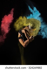 High jump dancer on the Indian festival of colors Holi