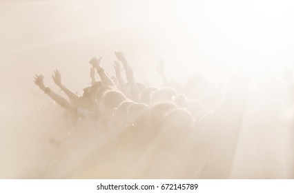 High Key Background With A Picture Of A Crowd Of People On An Open Playground At A Concert. Abstract Soft Focus Image With Copy Space