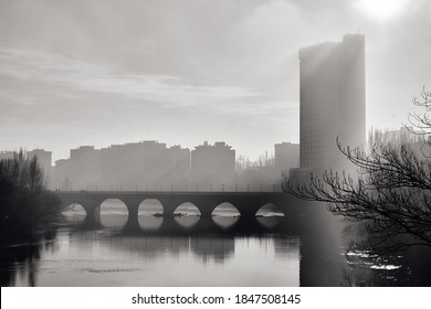 High Key Photo Of The Valladolid Cityscape With The Puente Mayor Bridge Upon The Pisuerga River. 