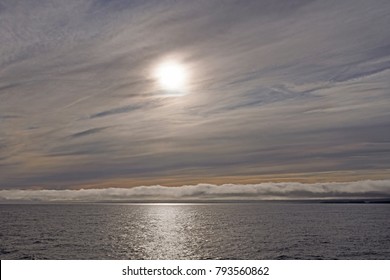 High and Low Clouds on the Ocean near Baffin Island in Nunavut, Canada