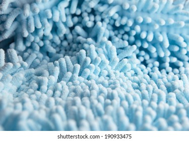High magnification macro of blue high absorbent fabric or carpet, pile section. 