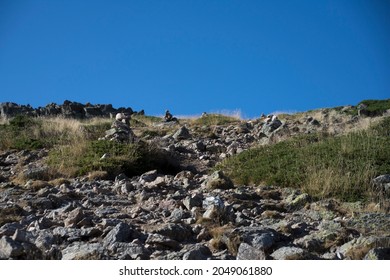 High mountain landscape with different landmarks indicating the way, hiking