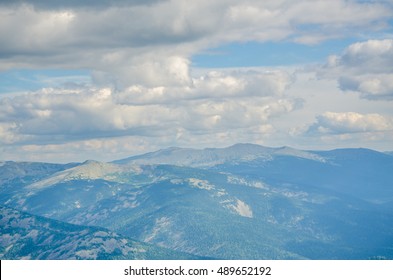 in the high mountains clouds float. 