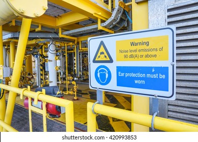 High noise alert sign, Protection equipment sign on offshore wellhead remote platform working area, Energy and petroleum industry.
