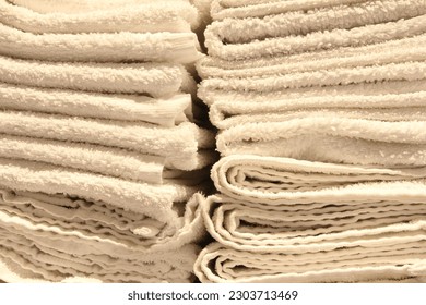 High piles of white and clean towels.