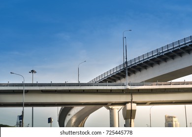 High Pillars Of Expressway. The Concept Of The Straight And Thorny Path.