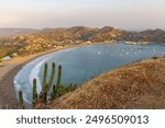 High point panoramic view from Christ of the Mercy statue standing on a cliff above the bay of San Juan del Sur in Nicaragua.