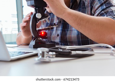 High precision engineering with man working with microscope