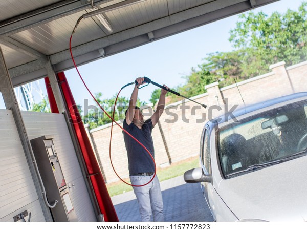 High pressure cleaning the car
