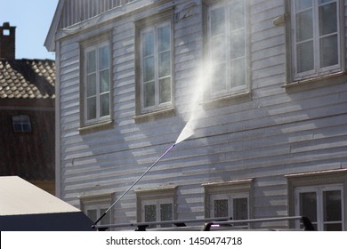 High Pressure Cleaning Of Wall House 