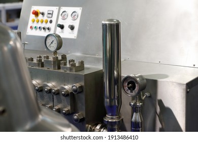 High pressure homogenizer in a food factory. Selective focus.