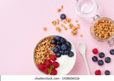 High Protein And Diet Breakfast. Homemade Granola Crisp With Raspberry, Blueberry And Greek Yogurt. Top View.