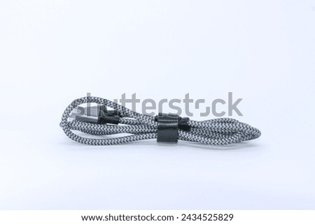 High quality 3 ampere braided cable charging for smartphone on isolated white background. 