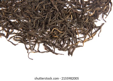 High quality black Kenyan tea with a high content of tea tips. Kenyan black tea close-up on a white background