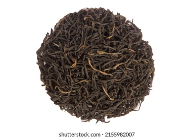 High quality black Kenyan tea with a high content of tea tips. Kenyan black tea close-up on a white background