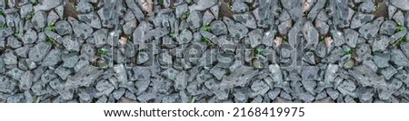 High quality designs for Kitchen splashbacks. Design for Glass print. The texture of a stone wall. Old castle stone wall texture background. A stone wall as a background or texture. 