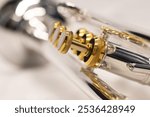 High quality detailed close-up shots of professional trumpet valves, slides, water key corks