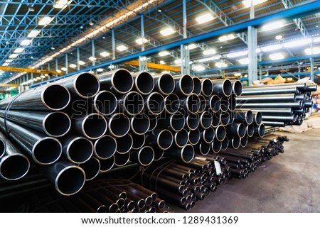 high quality Galvanized steel pipe or Aluminum and chrome stainless pipes in stack waiting for shipment  in warehouse