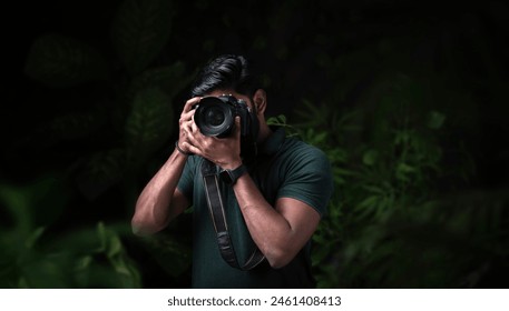 High quality photo of photographer taking picture of nature, Wildlife photography concept image, photography advertising banner type photo - Powered by Shutterstock