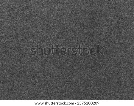High rectangular black and grey sandpaper surface texture, background sanding paper