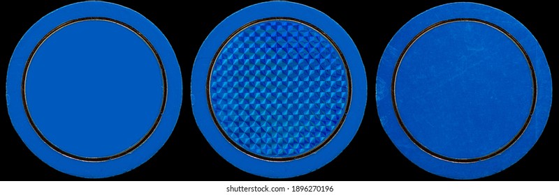 high res macro photo of blue poker chip or carousel coin on black background. 