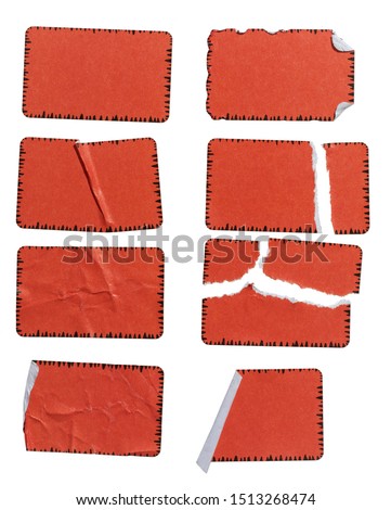high res macro photo of cool set of red paper stickers isolated on white background with tears or snags and folds, matt crumpled stickers
